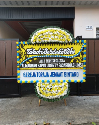 Papan Bunga Duka di Adiwerna